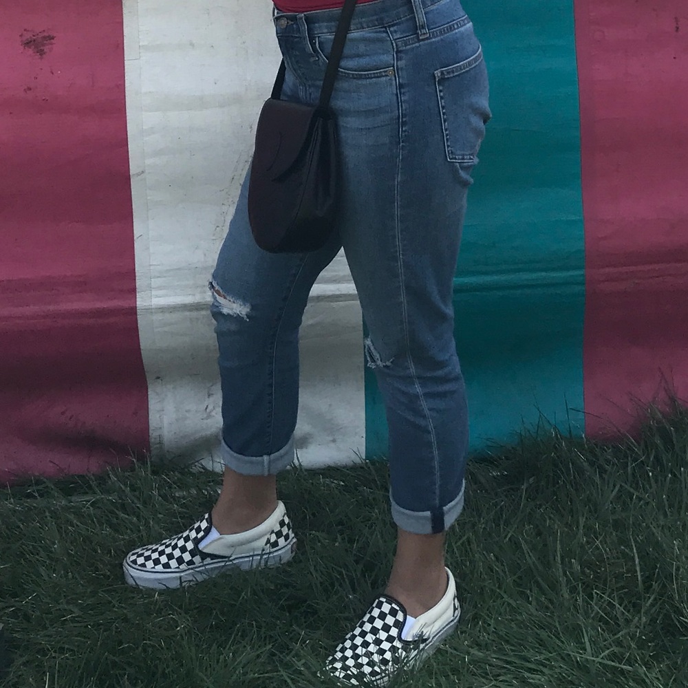 Blue Uniqlo mom jeans with rips in knees. :)